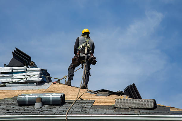 Professional Roof Replacement technician working in Dayton, MT